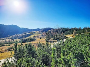 Sky, Blue, Mountainous Landforms, Green, Vegetation, Mountain, Natural Landscape, Hill, Wilderness, Highland