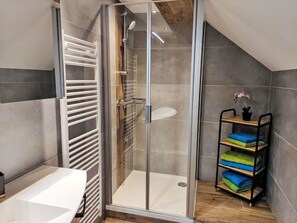 Flooring, Floor, Plumbing, Plumbing Fixture, Bathroom, Shower Door, Wood Flooring, Shower, Tile, Hardwood