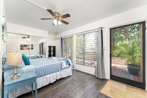 Relax in comfort with A/C, queen bed, and private lanai access.