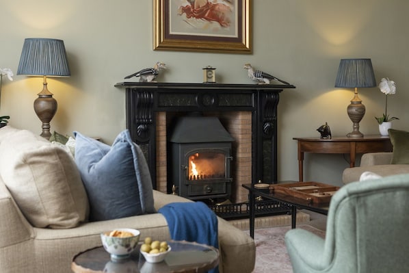 New Ladykirk Farmhouse - the log burner in the drawing room