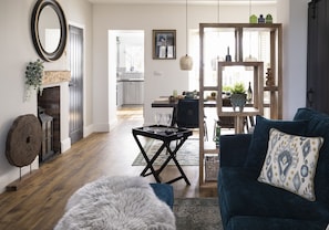 Pigswood Cottage - a view through the open-plan living space to the kitchen
