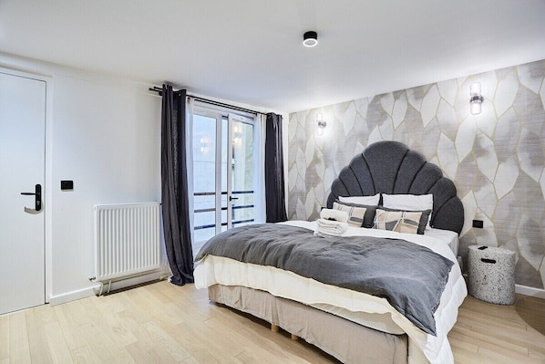 Grand studio avec lit queen size
