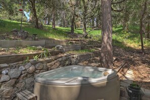 Relax in the private hot tub 