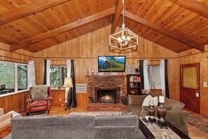 Living area with ample seating and Smart TV