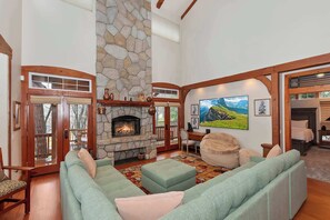 Living area with sectional seating and Smart TV