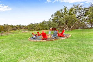 Fire pit area in the spacious back yard