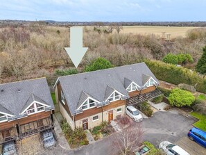 Views to rear and parking to front