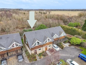 Views to rear and parking to front