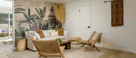 Another living room view displaying the sofa to be transformed into an additional bed.
