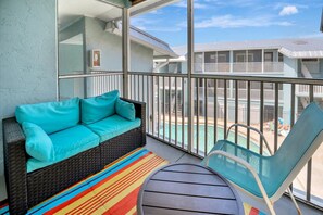 Screened lanai with pool view