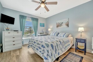 Queen bedroom with TV