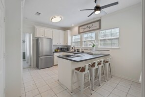 Cute kitchen with bar style seating