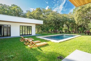 Pool with beach chairs
