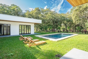 Pool with beach chairs