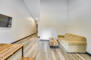 Studio | Full Sleeper Sofa | Dining Table | Single-Story Unit
