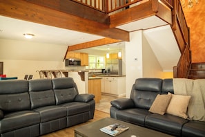 Open floorplan with a Living room area with Smart TV, dining area and kitchen