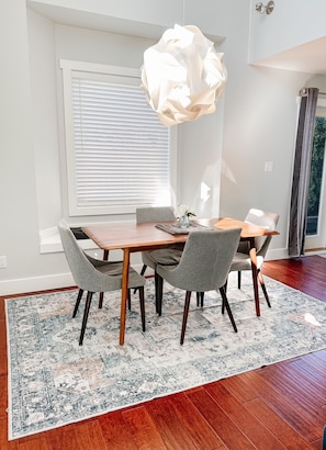 Dining table can be moved to include the window bench and seat up to 6 people.
