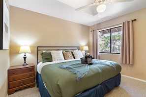 Primary room with night stand, smart tv, dresser and lots of closet space-ensuite