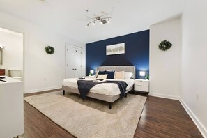 A simple yet elegant bedroom with all essentials for a comfortable and peaceful stay.
