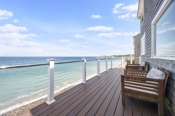 Ocean views with deck and patio furniture