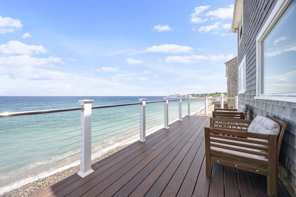 Ocean views with deck and patio furniture