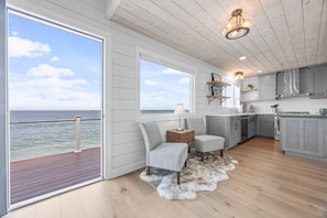Sitting area and kitchen with ocean view
