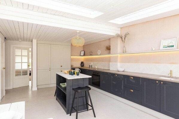 This home is the perfect base for families and friends to unwind and explore the coast.
