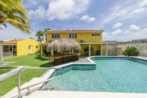 Enjoy sunny days and vibrant colors in this tropical oasis!