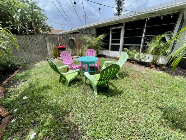 Fenced in backyard with Grill