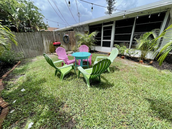 Fenced in backyard with Grill