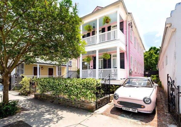 Experience the perfect blend of Southern charm and modern comfort in our beautifully restored pink house.