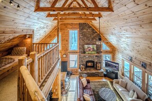 Bright and airy view of the living room below. 