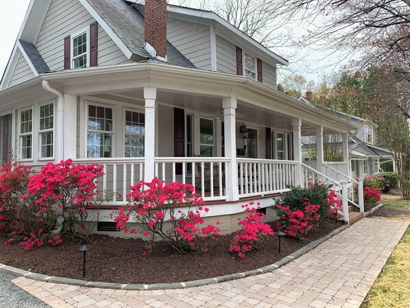 Enjoy the front porch. Sit a while on our rockers and people watch.