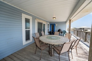 Anchor Eways Covered Outdoor Dining Space with Canal View