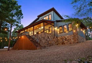 As the sun sets, Tender Mercies glows with warm lights and inviting charm — the perfect backdrop for an unforgettable getaway.