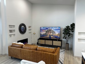 Leather sofa and FRAME TV with rotating art when not in use