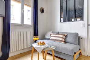 The bedroom and kitchen