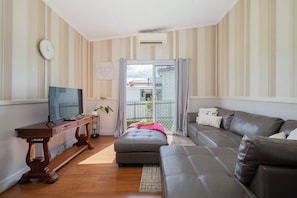 Let the natural light pour in through sliding doors while you stay comfortable with split system air conditioning and heating.