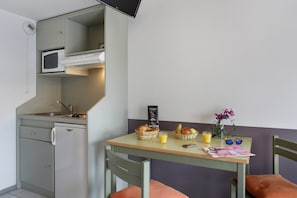 Reconnect with loved ones over a meal at the dining table.