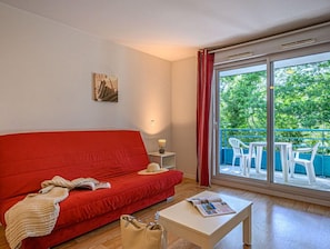 Sink into the cozy sofa after a day exploring the area.