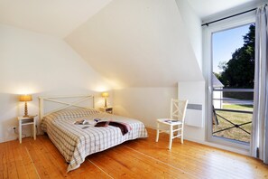 The master bedroom features a cozy Double bed.