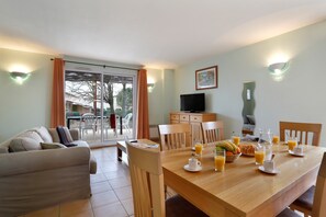 Share meals and laughs at the dining table.