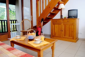 Our apartment has bedrooms upstairs, providing ample space for your group.