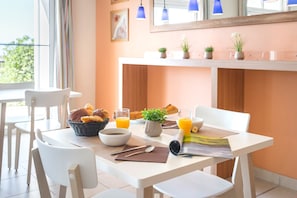 Enjoy dining together or entertain at the dining room table.