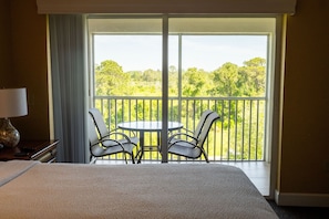 Enjoy a private furnished balcony with stunning views, inviting you to unwind in the fresh air.