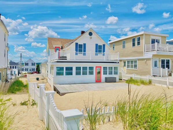 Cutest house on the beach! Direct beachfront. Sandy fenced yard. Upper walkout balcony. 