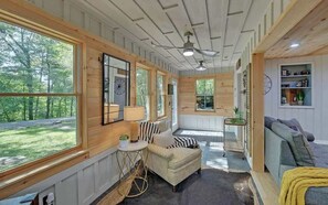 View of the front door that leads into the first common space. 