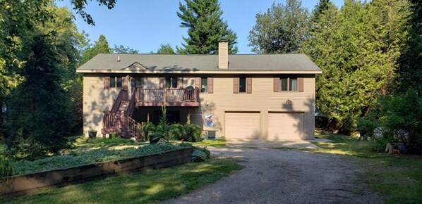 Welcome to your serene North Shore retreat, tucked away in lush greenery with no neighbors in sight for total privacy.