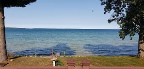 Just steps from the house, enjoy breathtaking sunsets and direct access to the calm waters of the North Shore.