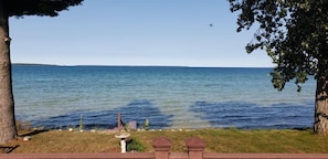 Just steps from the house, enjoy breathtaking sunsets and direct access to the calm waters of the North Shore.